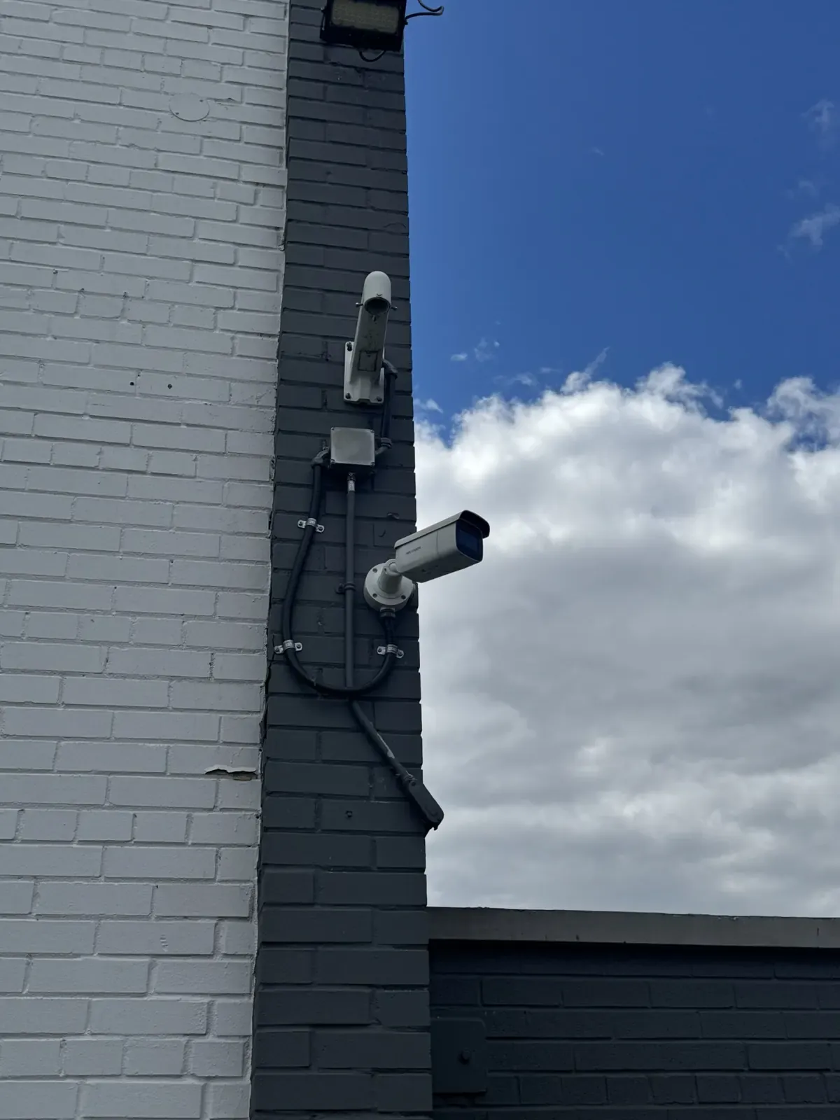 security camera mounted on building exterior